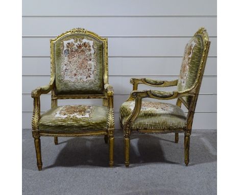 A pair of Continental carved giltwood framed open armchairs, with tapestry upholstery 