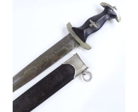 A German SS dagger, etched motif to blade, marked Gottlieb Hammersfahr Solingen, with nickel-mounted scabbard, length 38cm 