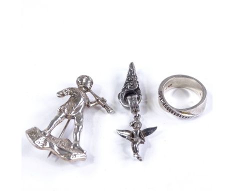 A Walt Disney sterling silver Tinkerbell pendant, an unmarked silver Peter Pan brooch, and a sterling silver Esprit ring (3) 