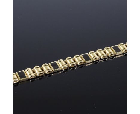 A 14ct gold black enamel panel bracelet, length 21cm, 2.13g 