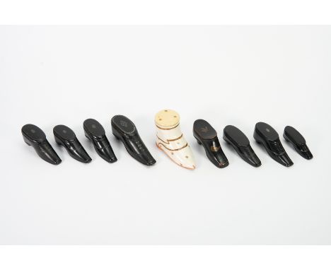Charming collection of eight Georgian treen snuff boxes in the form of various shoes, heightened with silver inlay, the large