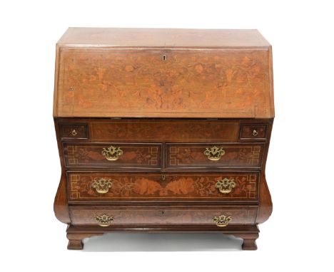Early 19th century floral marquetry inlaid bombe shaped bureau, having a fall-front to reveal a fitted interior of drawers, p