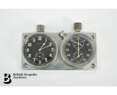 Vintage 1950's Heuer Hervue rally dashboard car clock, having a 1.75" black dial signed Hervue with Arabic numerals and subsi