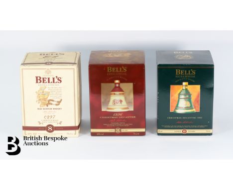 Six boxed Bells Christmas Whiskey decanters with contents 1992, 1993, 1994, 1995, 1996, and 1997.&nbsp;