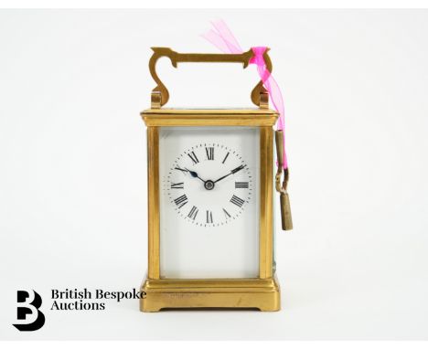 French R &amp; Co gilt brass carriage clock, with bevelled glass panels, stamped Made in Paris to the movement, approx 8 x 7 