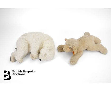A Steiff lamb Boeky, complete with the button in the ear approx 28 cms in length together with another Hansa sleeping polar b