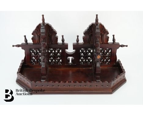 An Edwardian mahogany wall shelf, with pierced decoration, approx 54 x 31 x 21 cms together with a floor standing magazine ra