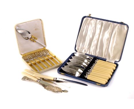 A canteen of flatware, together with a pair of antler handle fish servers, a bone handled silver plated table scoop and vario