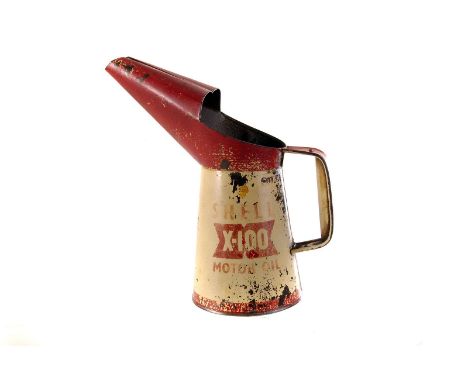 A vintage Shell X-100 Motor oil can, decorated in red and white paint