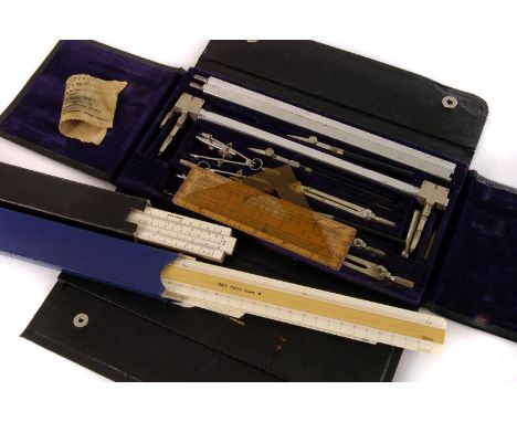 A W.H Harling geometry set, together with a slide calculator plus other drawing equipment (parcel)