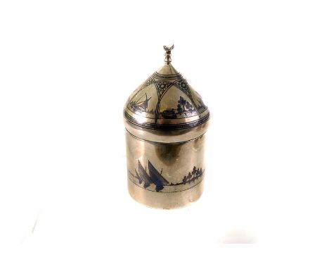 A Middle Eastern silver Neillo work box, having various land and sea scape decoration, the domed lid with small bird finial, 