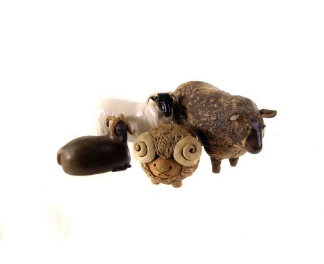 A Beswick figure of a sheep and lamb, together with a large collection of various ceramic sheep figures (2 boxes)