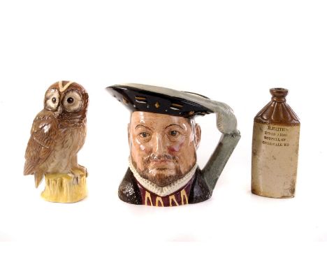 A Whyte & Mackay 'Tawny Owl' ceramic whisky decanter, together with a H.Smith King Arms stoneware flask, and a Royal Doulton 