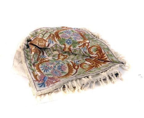 An embroided tapestry/wall hanging, having large central medallion surrounded by a foliate border, approx 160cm by 117cm