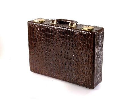 Four vintage business briefcases, one unused