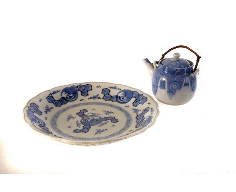 A pair of Chinese blue and white ceramic plates, together with a blue and white teapot, plus a larger blue and white ceramic 