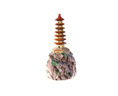 Clarice Cliff for A.J. Wilkinson, a flower bowl centre block modelled as a pagoda above a rocky base, with walkways, bridges,