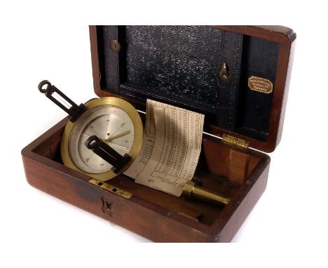 A brass naval compass, having brass fittings, in wooden case