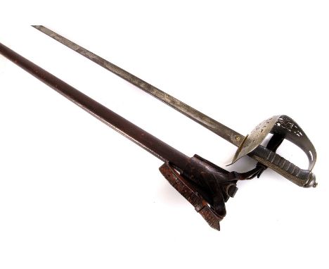 A George V Infantry sword, The large hand guard having pierced design with GRV to front, the blade by J.R Gaunt & Son Limited