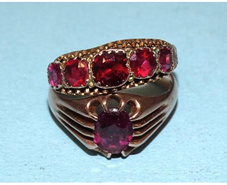 Two 19th century 9ct gold rings set red paste stones, sizes P and R, 5.6g, (2).
