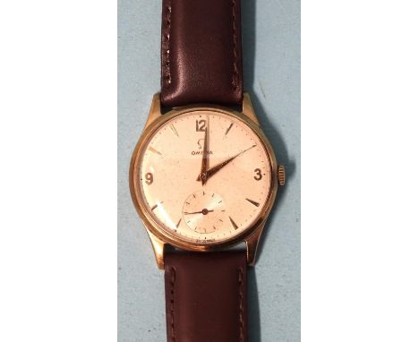 Omega,&nbsp;a gentlemen's 9ct gold cased wristwatch, the cream dial with Arabic '3', '9' and '2', remainder dart numerals, se