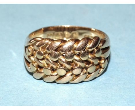 An 18ct gold knot ring, size R½, 11g.