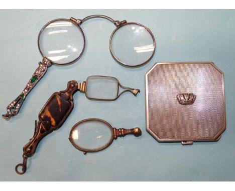 A Continental 935-silver pair of lorgnettes, the handle set with green and white paste stones, (one stone missing), an engine
