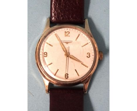Longines,&nbsp;a 1961 gentlemen's 9ct gold cased wristwatch, the cream dial with Arabic '3', '9' and '12', remainder baton nu