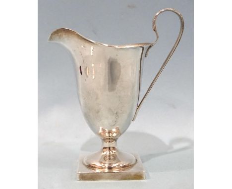 A late-Victorian helmet-shaped cream jug on square base, 12.5cm high, London 1900, ___3.4oz.