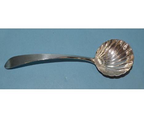 A George III Irish silver small ladle with shell-shaped bowl, 18.5cm, Dublin 1787?, maker John Shids....?, ___1.6oz.