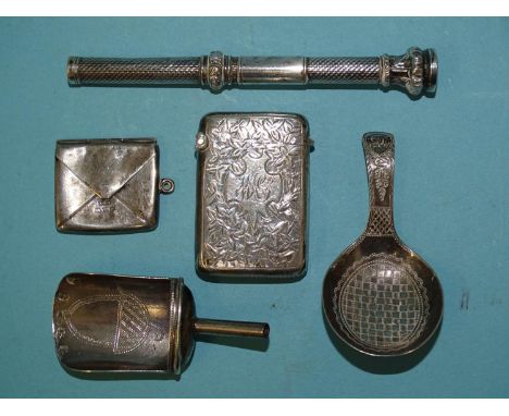 A small Georgian silver caddy spoon, Birmingham 1809, by Joseph Willmore, a silver Vesta case, a stamp case in the form of an