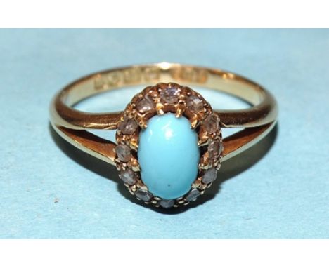 A turquoise and diamond cluster ring claw-set an oval turquoise within surround of twelve rose-cut diamonds, in 18ct gold mou