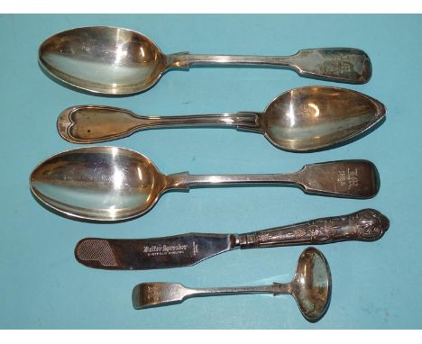 A pair of late-Victorian tablespoons, Sheffield 1892, maker JR, a small ladle, a silver-handled butter knife and a white meta