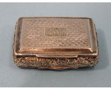 A George III silver vinaigrette with engine-turned and embossed floral decoration and gilt pierced grille, 4 x 3cm, Birmingha