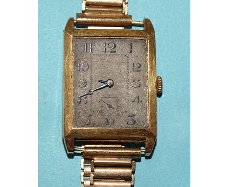 An 18ct gold-cased tank wrist watch c1930's, the silvered dial (discoloured) with Arabic numerals and seconds subsidiary, ove