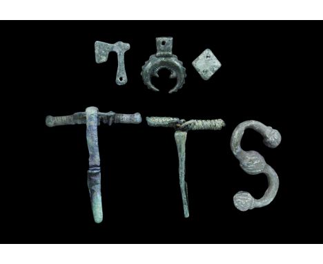 1st century BC-3rd century AD. A mixed group comprising: a La Tène Type II bow brooch; a P-shaped bow brooch; a miniature vot