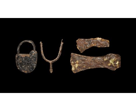 12th-15th century AD. A mixed group of iron items comprising: a felling axehead with flared blade; a side-axehead with ellipt