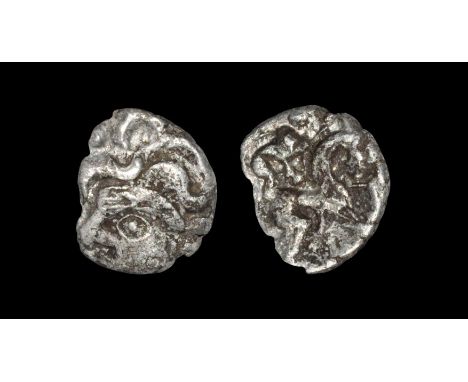 100-20 BC. Obv: broad oak head type head right with large eye, large snake like hair. Rev: horse right with boar above. 1.02 