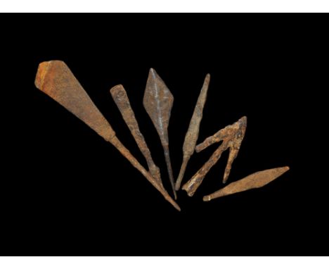 12th-15th century AD. A mixed group of iron arrowheads comprising: one broad barbed and socketted; one square-section, tanged