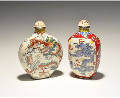 20th century AD. A mixed pair of ceramic snuff bottles comprising: one with a dragon to one broad face, fenghuang bird to the