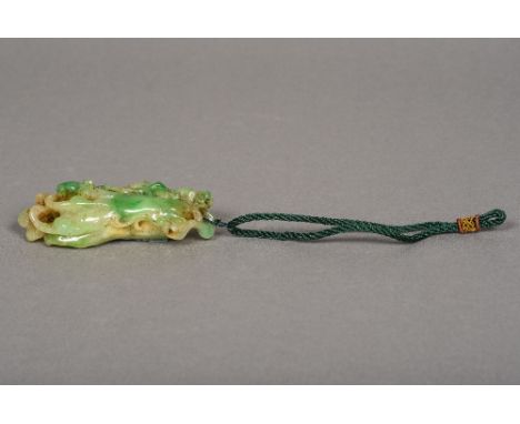 A Chinese carved green jade Buddha's finger9.5 cm long.    CONDITION REPORTS:  Generally good condition, expected wear.