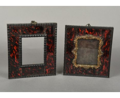 Two faux tortoiseshell miniature portrait framesBoth ripple moulded, one with gilt slip.  20 x 23 cm; and 19.5 x 22 cm overal