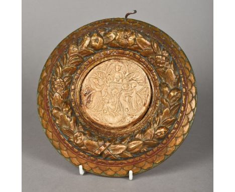 An antique wax seal Depicting children playing at a siege before a turret, housed in a carved giltwood frame. 20 cm wide over