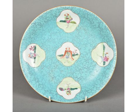 A Chinese porcelain dish Decorated with European figural vignettes on a simulated hardstone turquoise ground, blue painted si