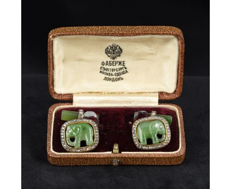 A pair of Russian diamond and jade set gold cufflinksEach fronted with a carved jade elephant in a diamond surround, boxed.  