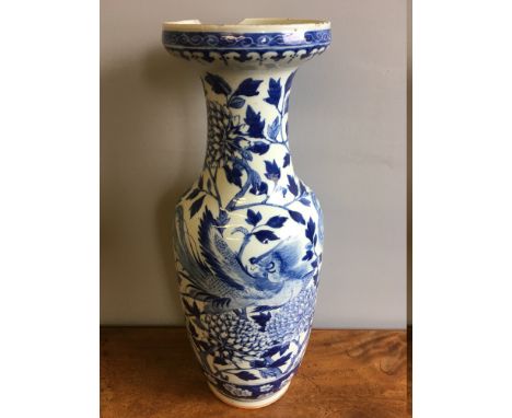 A 19th century Chinese blue and white porcelain vaseDecorated with phoenixes amongst floral sprays. 61 cm high.   CONDITION R