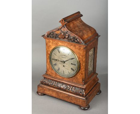 A Victorian walnut cased mantel clock by W C Bennett, BlackheathThe signed 8 inch silvered dial with Roman numerals, the unsi
