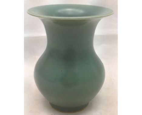 A Chinese porcelain vaseWith allover green glaze, blue painted six character Wanli mark to base.  12 cm high.    CONDITION RE