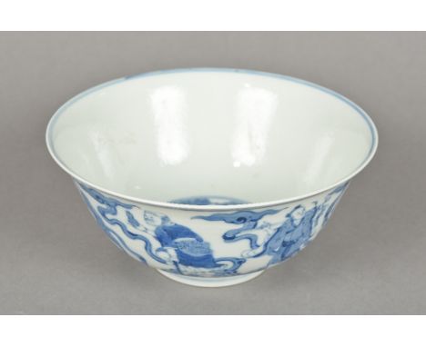 A Chinese blue and white porcelain bowlThe interior decorated with three scholarly figures, the exterior decorated in the rou