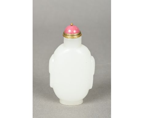 A Chinese carved mutton fat jade snuff bottle and stopper9 cm high.    CONDITION REPORTS:  Generally in good condition, expec
